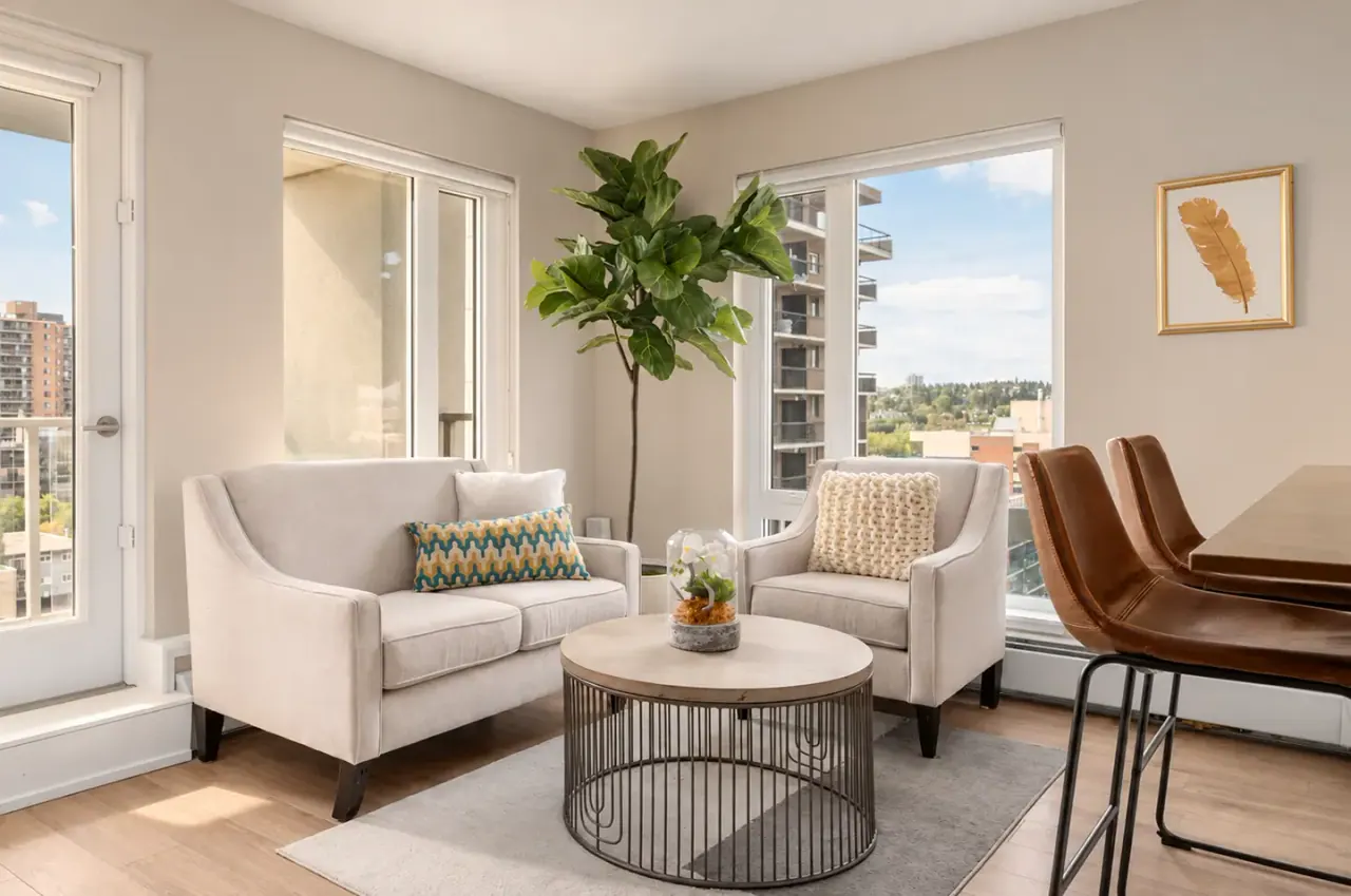 A bright Metropole suite living room used in the Meta ad creative