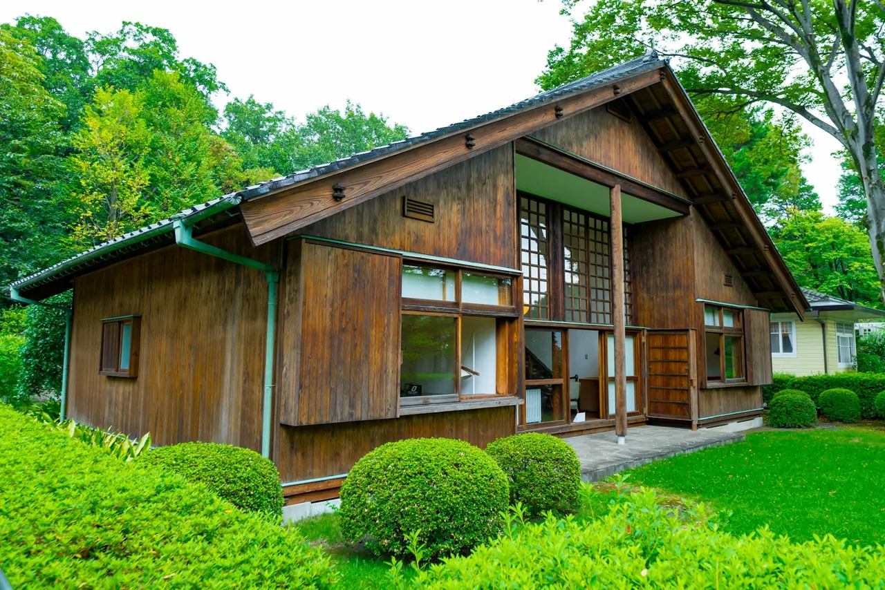 A timber house in a green garden