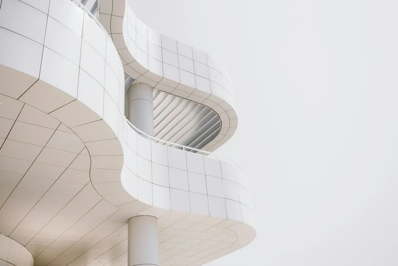 Curved white balconies of a modern building
