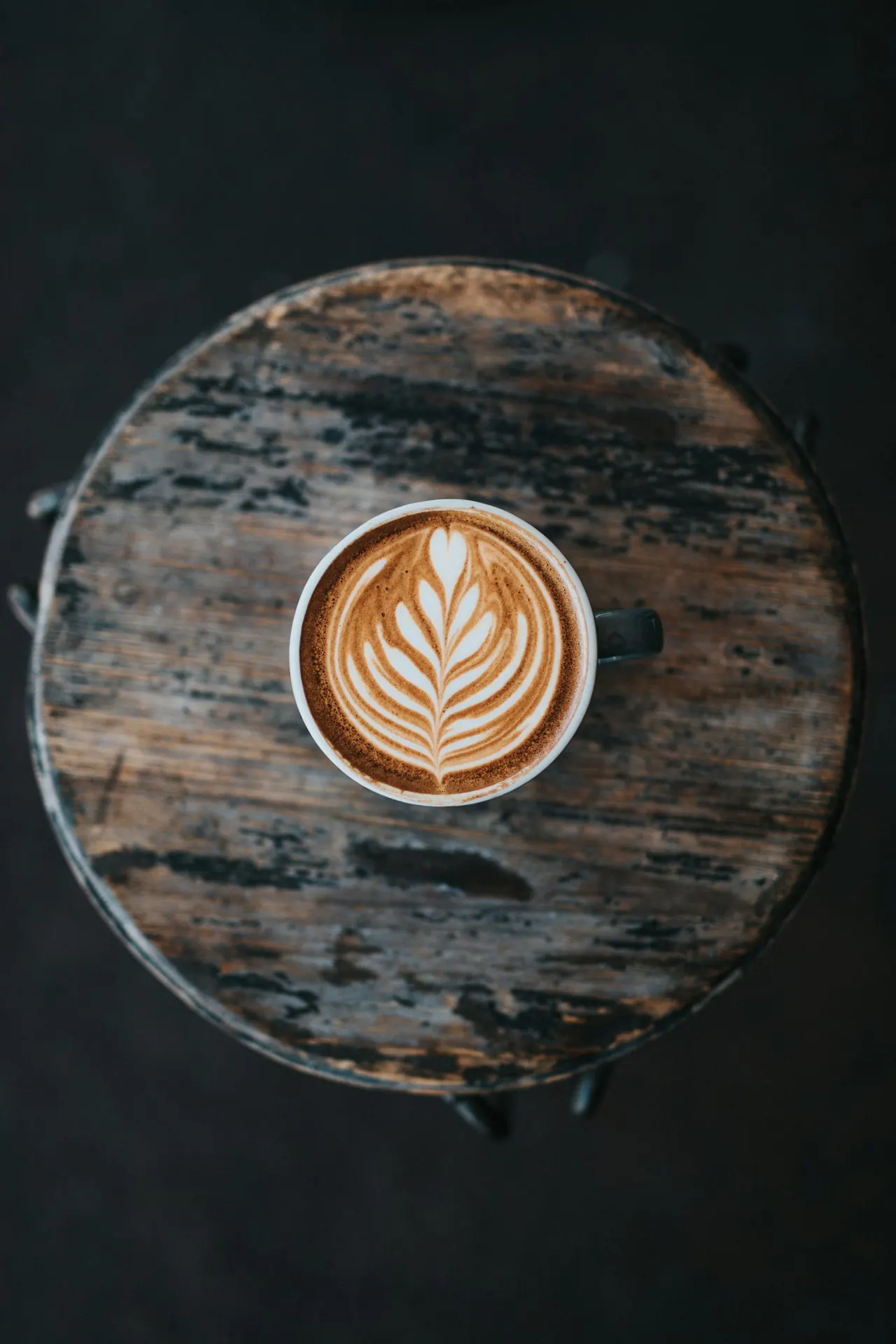 A cappuccino with latte art seen from above