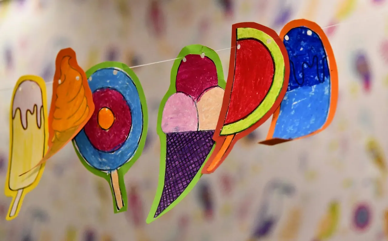 Paper craft ice creams and lollies hung on a string