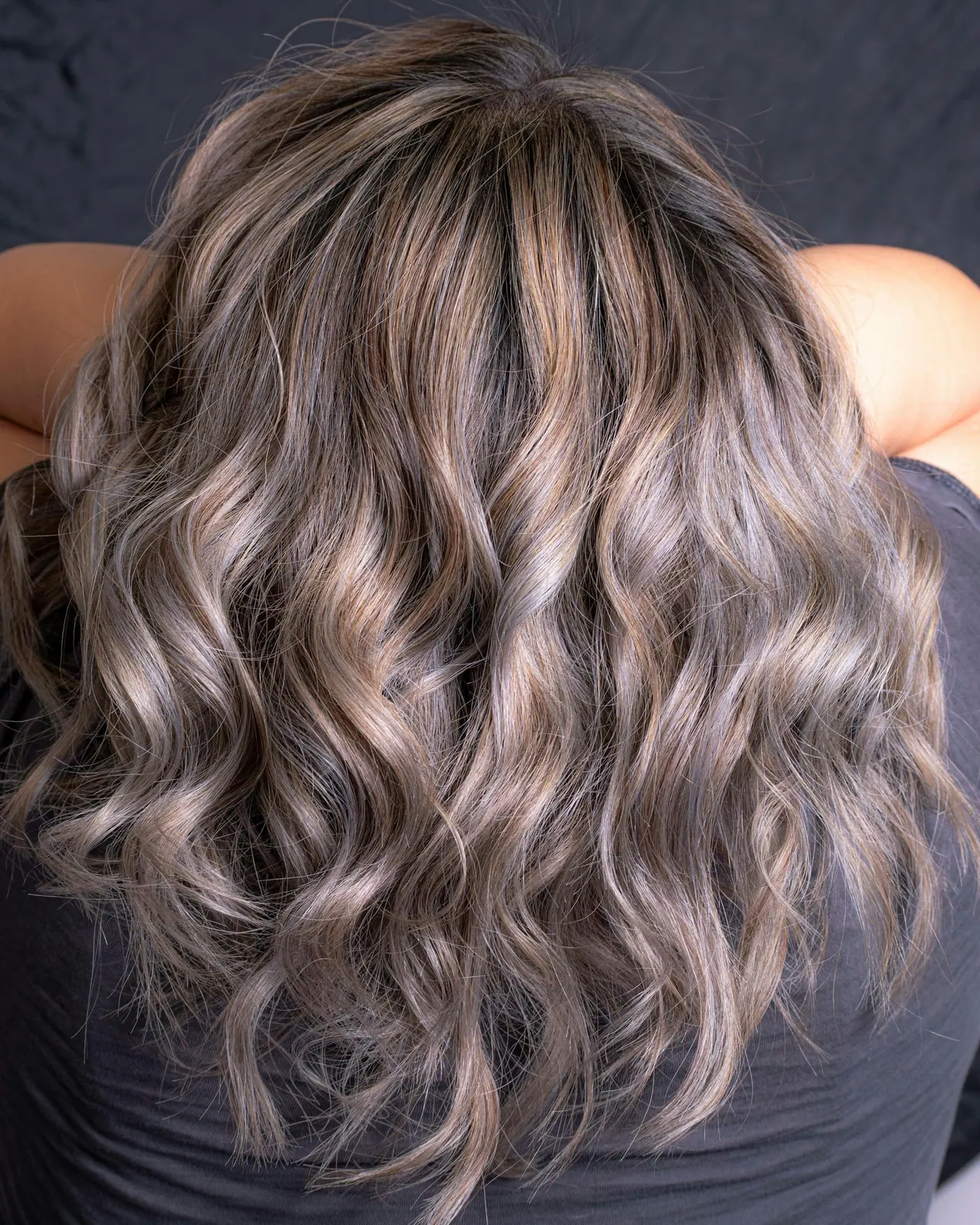 Silver and mushroom brown waves seen from behind