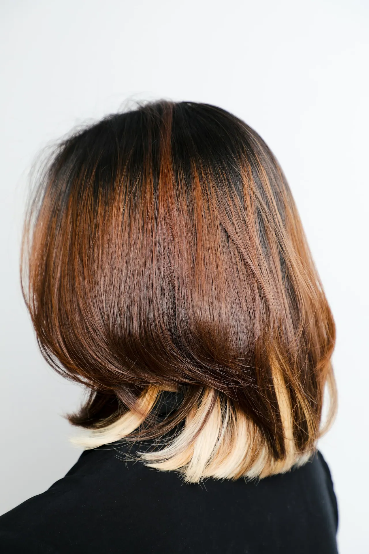 A copper bob with honey blonde ends