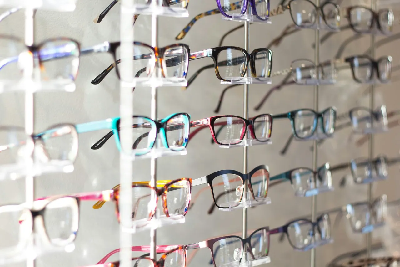 Rows of colourful glasses on a display wall