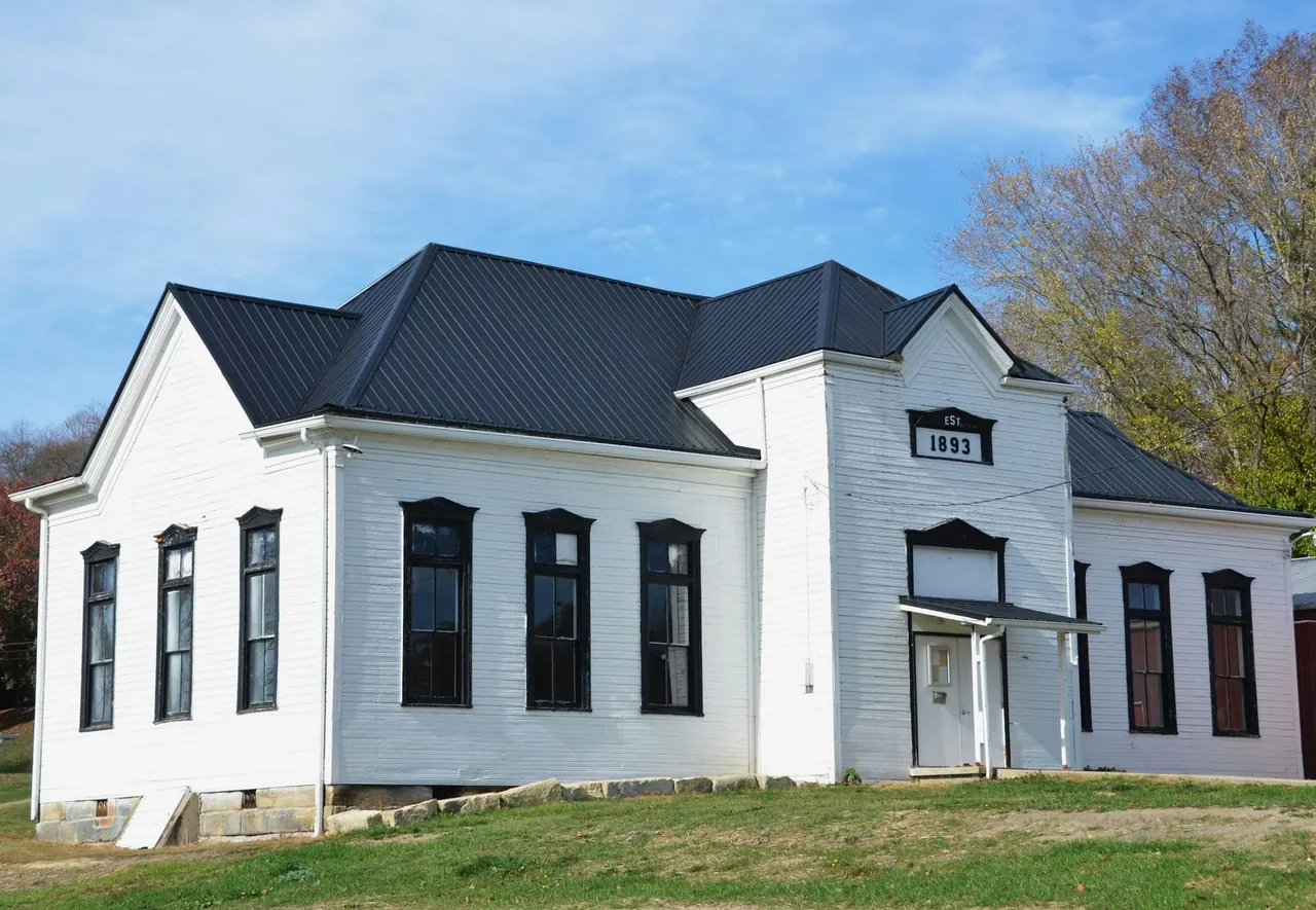 White farmhouse, standing seam metal